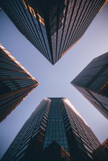 low-angle photography of four high-rise buildings by Kevin Matos courtesy of Unsplash.